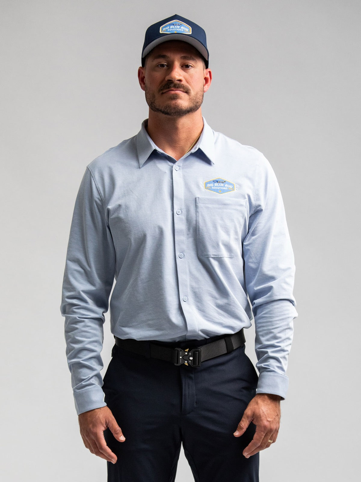 A Big Blue Bug team member in branded gear
